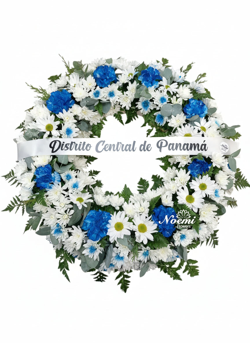 Corona Funebre de claveles azules y crisantemos - Noemi Flowers