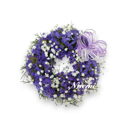Confeccionada con flores siempre viva y toques de gipsofilia  - Floristería Noemi Flowers