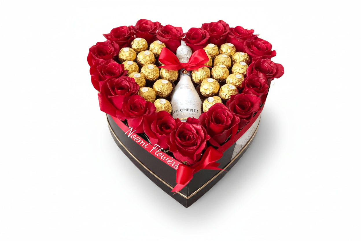 Caja corazon con rosas rojas bombones y botellita de vino espumante
