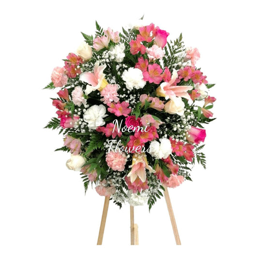 Tributo compuesto de astromelias, claveloes, rosas, lirios, gipsofilia helecho - Floristería Noemi Flowers
