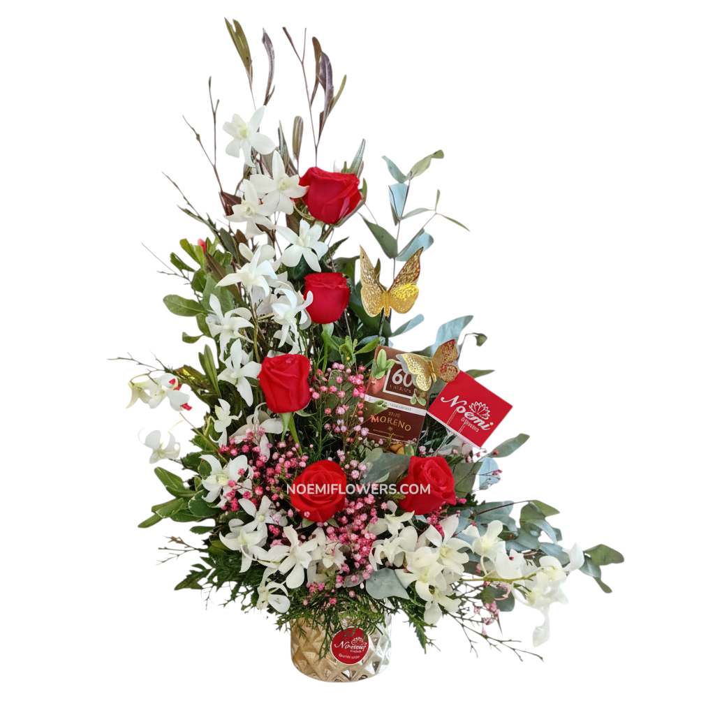 Arreglos floral confeccionado con rosas, orquídeas, gipsofilia y follaje variado - Floristería Noemi Flowers.