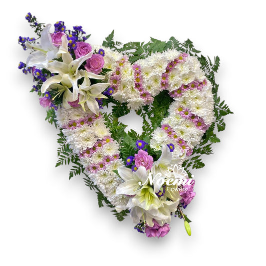 Confeccionada con lirios, rosas, Montecasino, crisantemos, daisys y follaje variado - Floristería Noemi Flowers. 