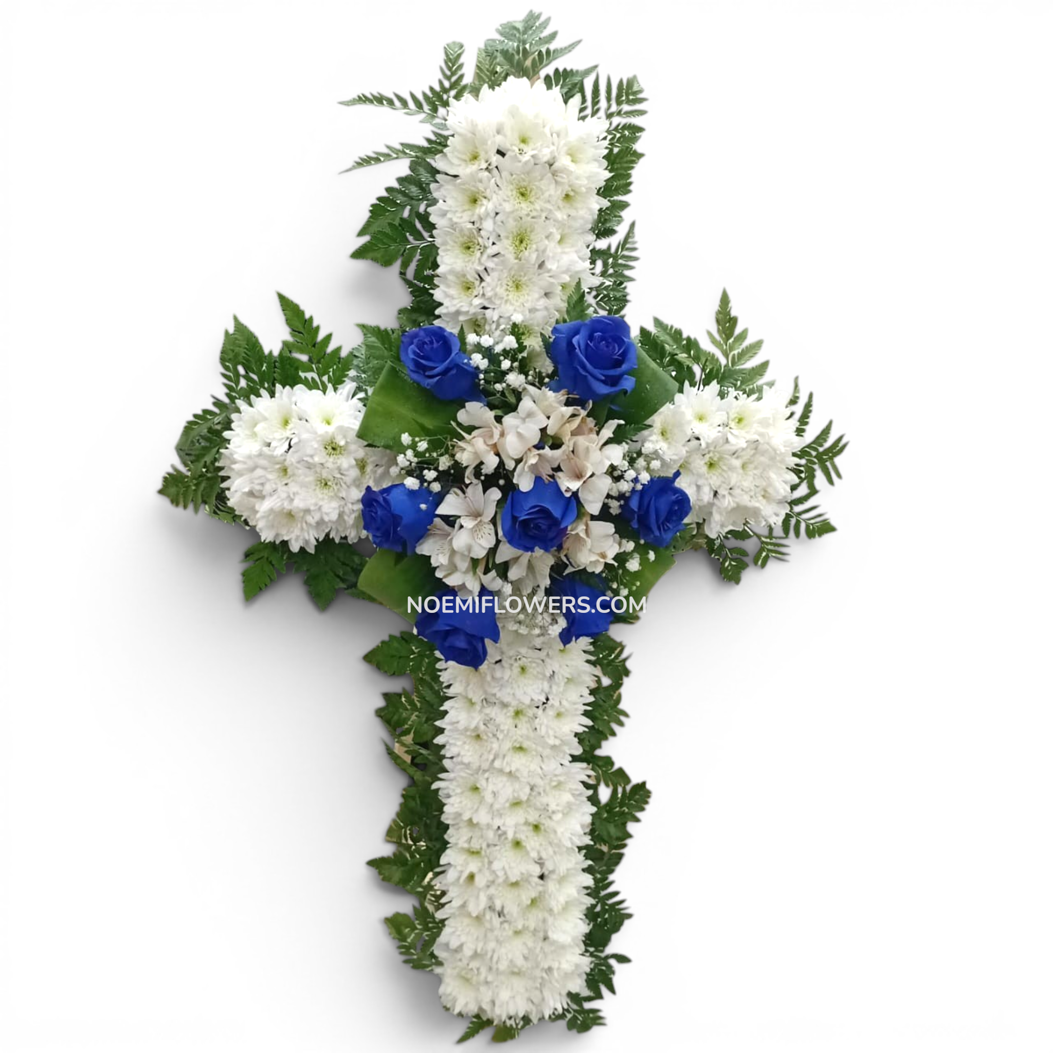 Corona fúnebre en forma de cruz confeccionada con rosas tinturadas en azul, astromelias, crisantemos - Floristería Noemi Flowers.
