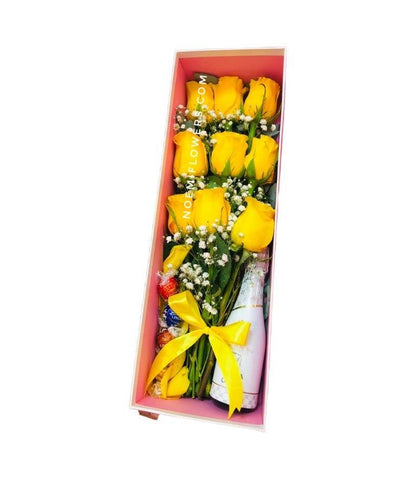 Caja con - Floristería Noemi Flowers rosas amarillas Bombones y Vino Espumoso - Noemi Flowers