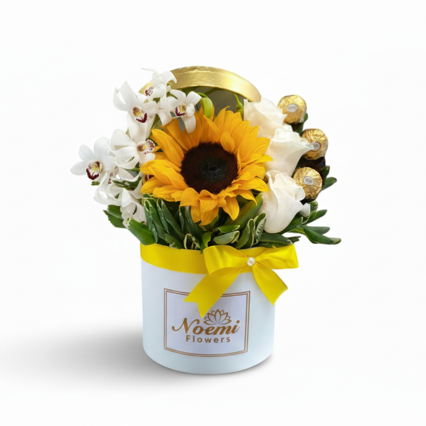 Confeccionado con girasol, orquídea, rosas y bombones Ferrero Rocher- Floristería Noemi Flowers. 