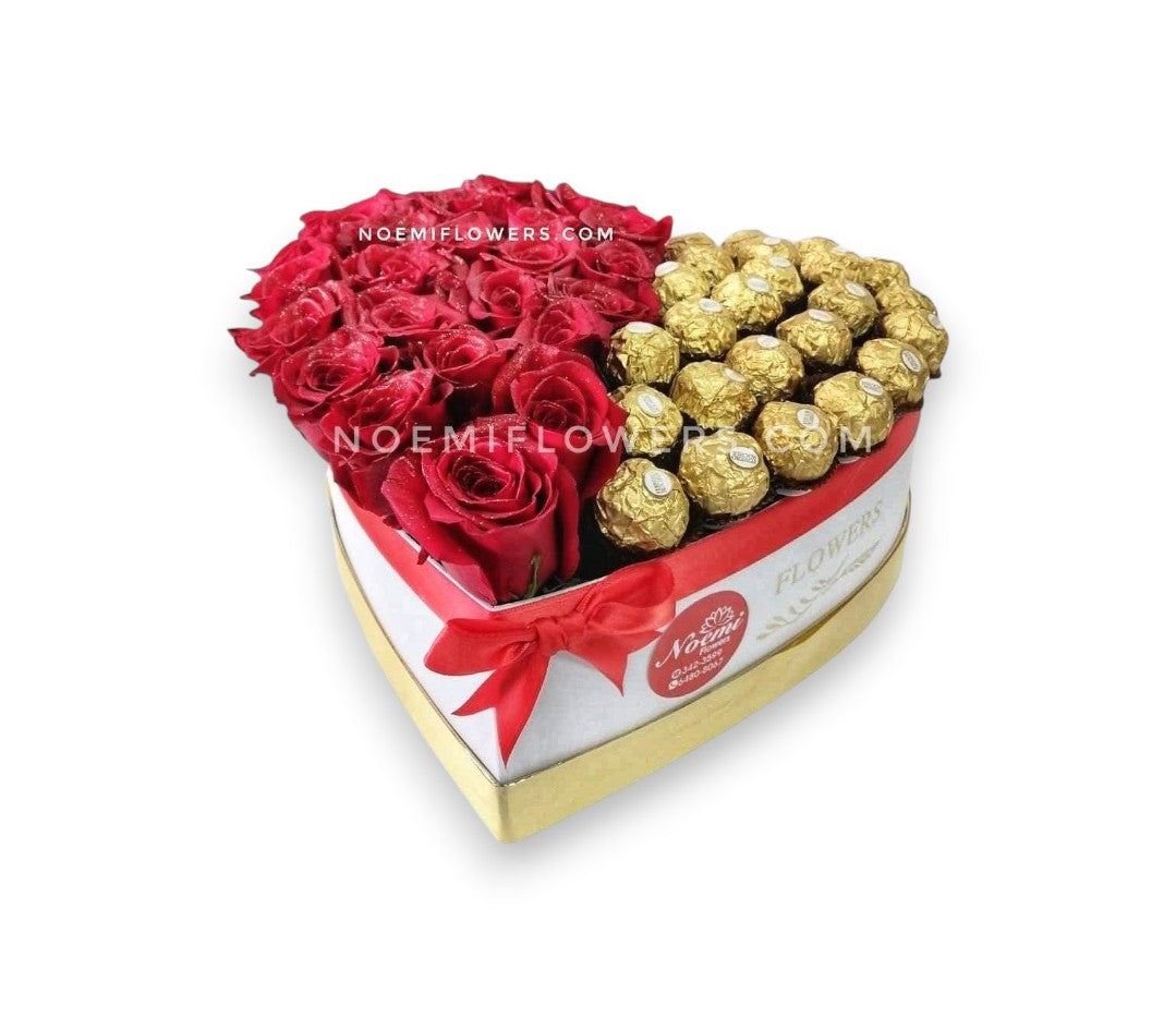 Base en forma de corazón cojn rosas rosas acompañado con bombones ferreros rocher - Floristería Noemi Flowers.