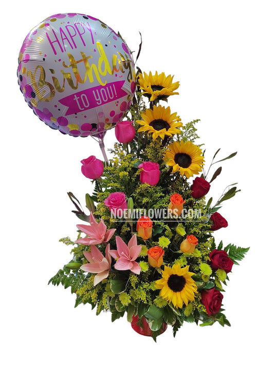 La Vida es Bella confeccionado con rosas, girasoles, lirios , follaje variado y globo de 18" - Floristería Noemi Flowers