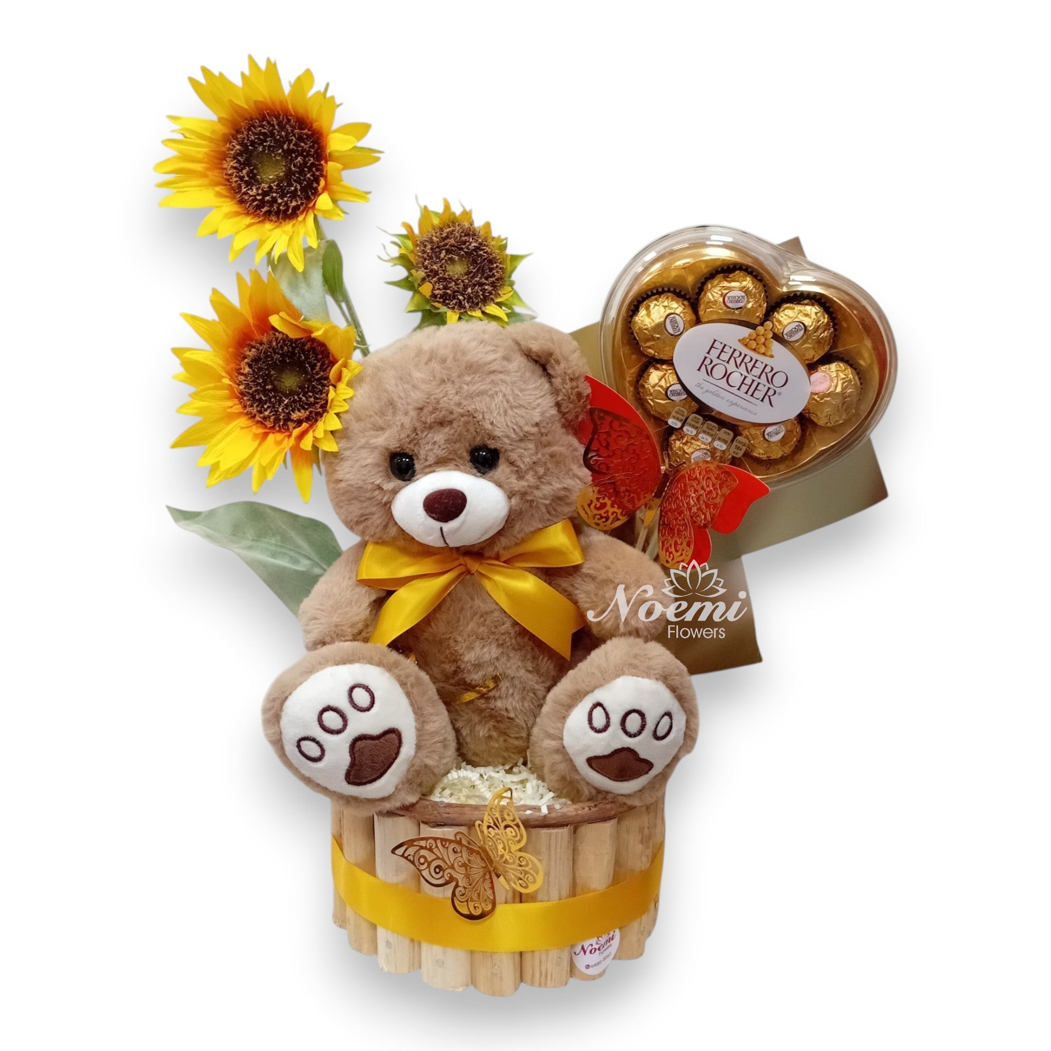 Arreglo floral compuesto por girasoles artificiales, peluche chocolate Ferrero Rocher - Floristería Noemi Flowers.