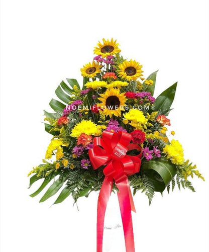 Pedestal 04 compuesto de girasoles, crisantemos, claveles, margaritas - Floristería Noemi Flowers