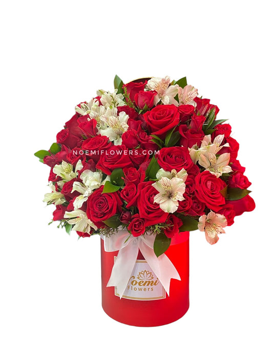Caja de rosas y mini rosas rojas en base redonda color roja - FLORISTERIA Noemi Flowers