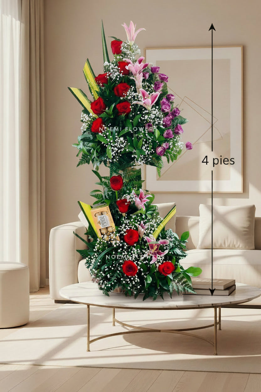 Arreglo regalo de 2 niveles que combina Rosas premium, Lirios elegantes, Mini rosas: Detalle original
Caja de chocolates - Floristería Noemi Flowers