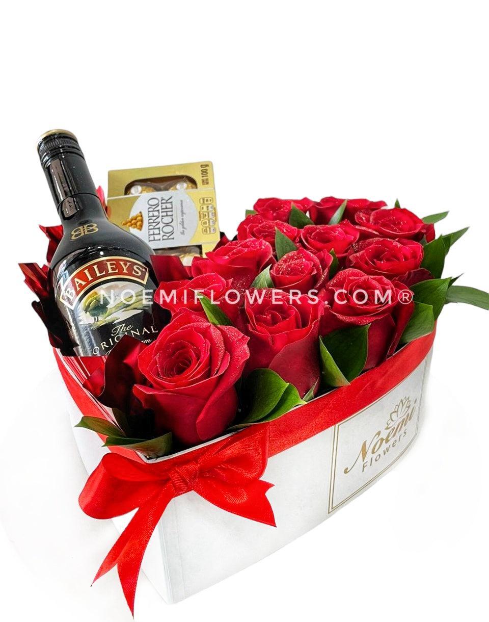 Sentimental confeccionado con rosas, Ferrero Rocher x8 y botella de baileys de 375ml  - Floristería Noemi Flowers