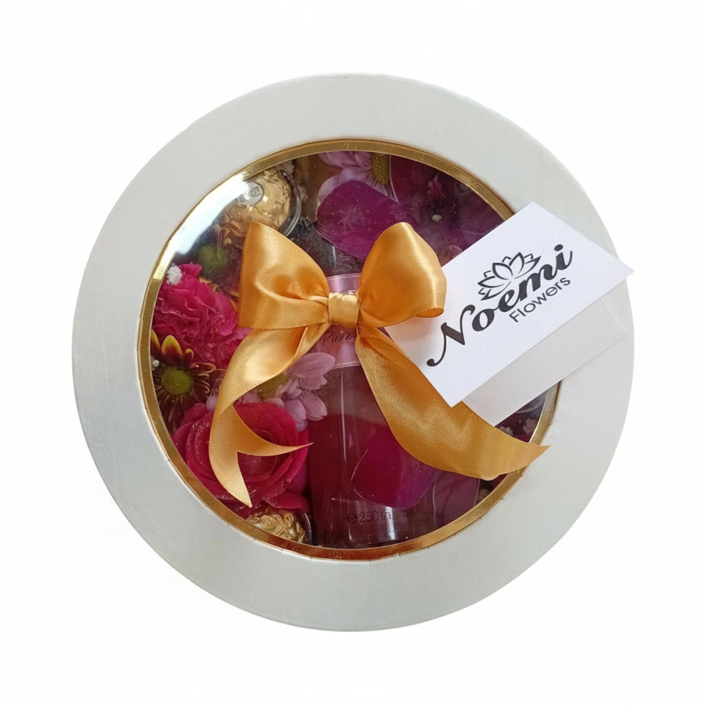 Arreglo floral confeccionado con variedad de flores  - Floristería Noemi Flowers.