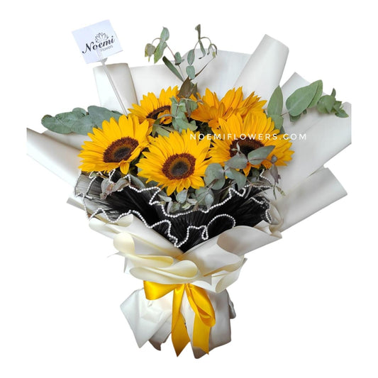 Bouquet de girasoles y eucalipto-Floristería Noemi Flowers. 
