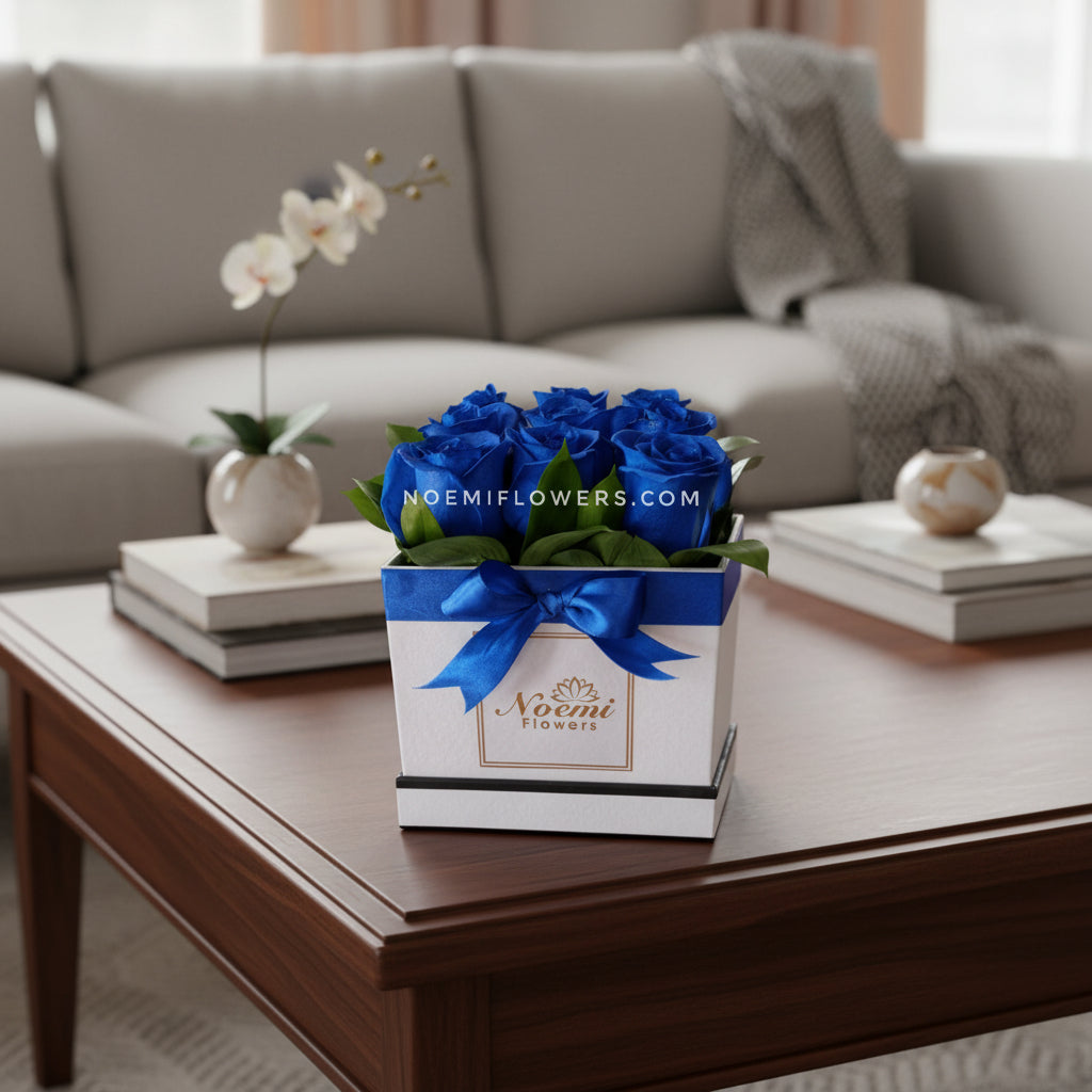 Caja balnca con 9 Rosas Azules - Floristería Noemi Flowers