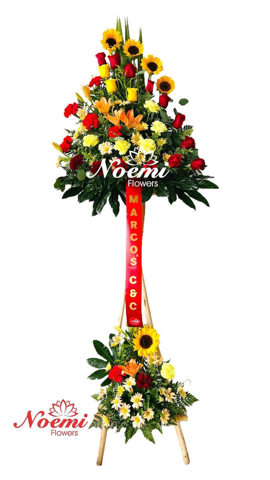 Pedestal 19 Compuesto de girasoles, rosas, claveles, lirios y margaritas  - Floristería Noemi Flowers