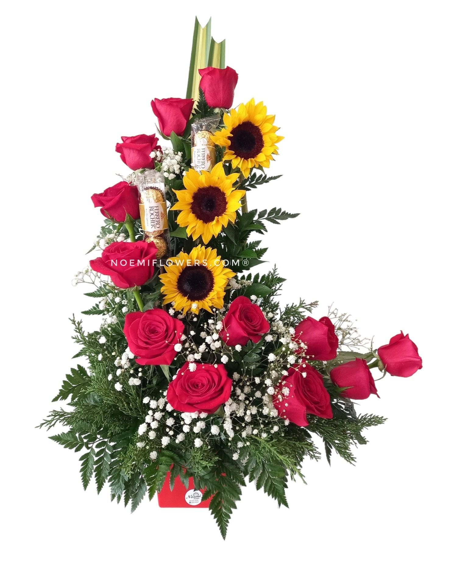 Arreglo de 12 rosas rojas y 3 girasoles con chocolates Ferrero - Floristería Noemi Flowers